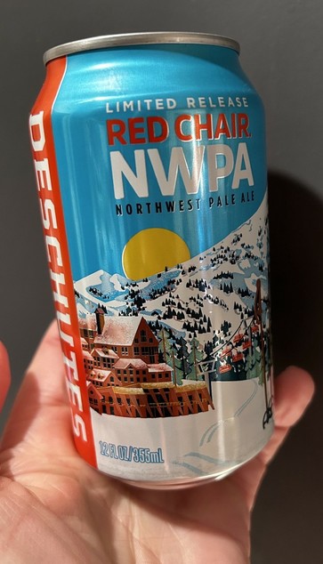 A can of Deschutes beer, 
scene of a snowy mountainside, chalet, ski lift, and a sun peeking over the mountainside in a blue sky.
LIMITED RELEASE 

RED CHAIR NWPA NORTHWEST PALE ALE 12FL01/355ml
 