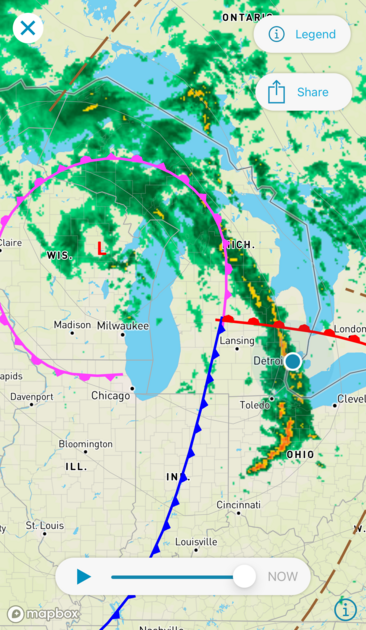 Weather and radar map centered on Lake Michigan showing an occluded front circling from ~Chicago to Marquette to Grand Rapids, nearly a closed circle.